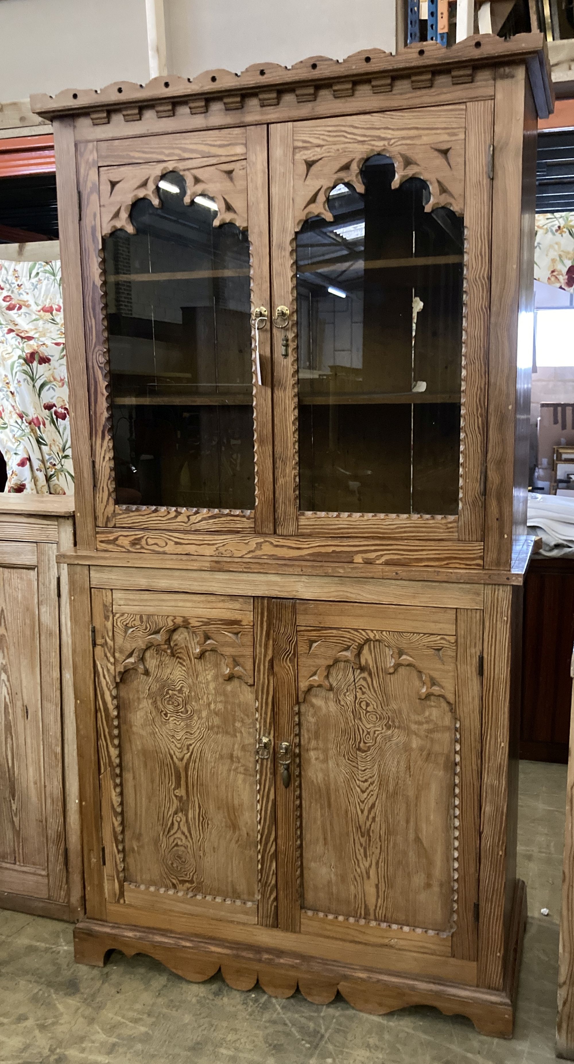 A 19th century Continental pine glazed cabinet, width 112cm, depth 49cm, height 214cm